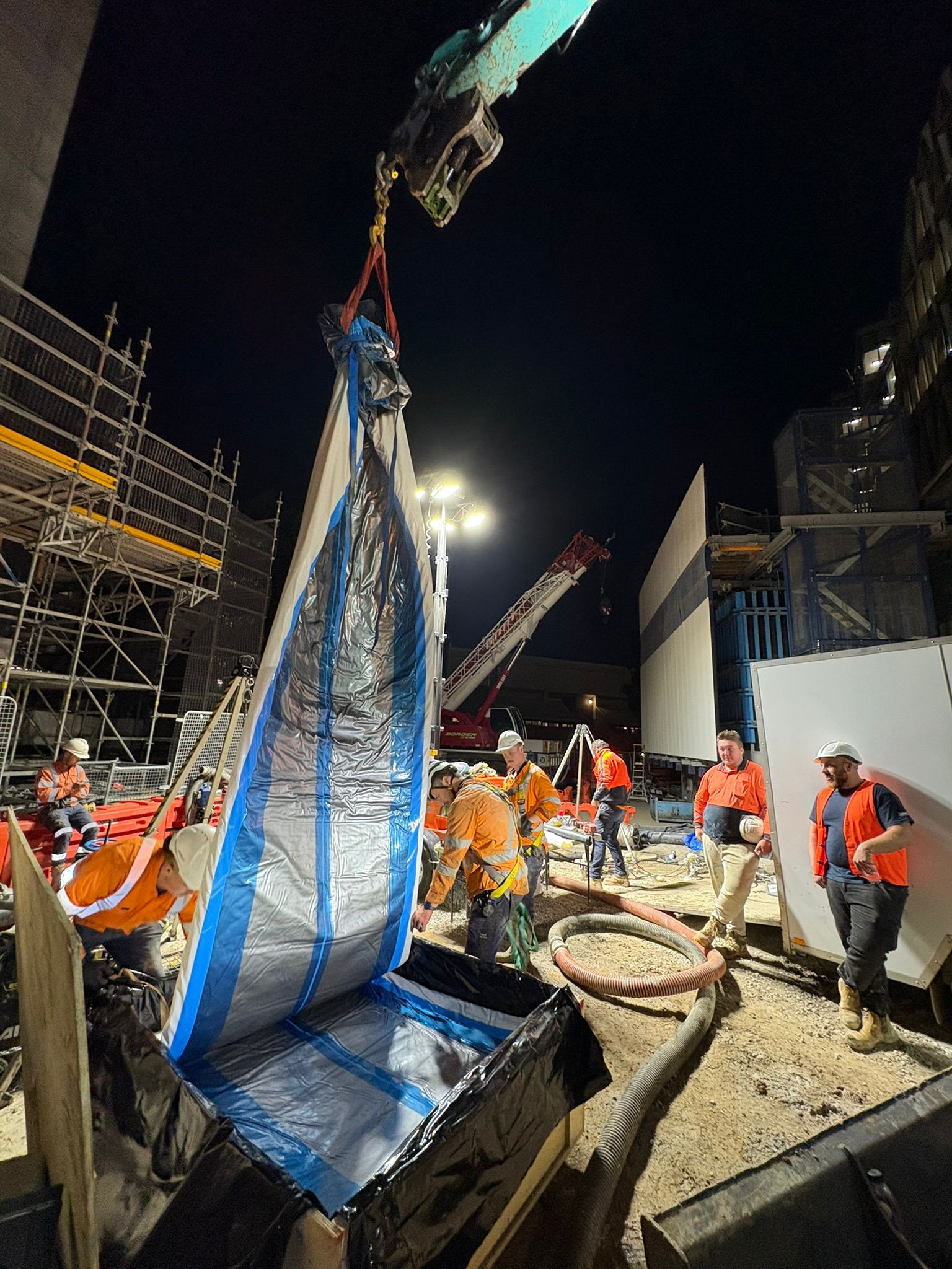 Liner being lowered into position during after-hours works